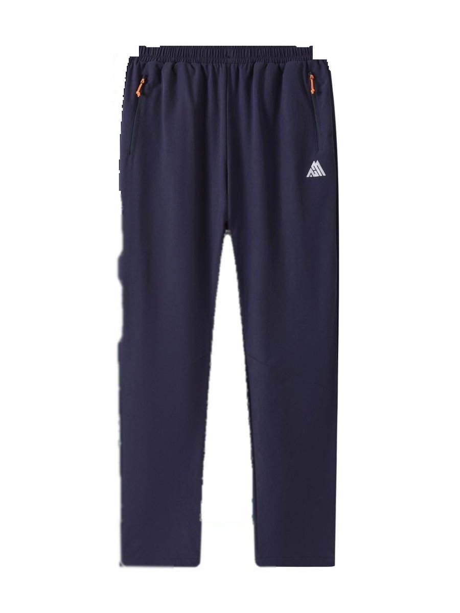 Navy performance trousers with zipped pockets and elasticated waist